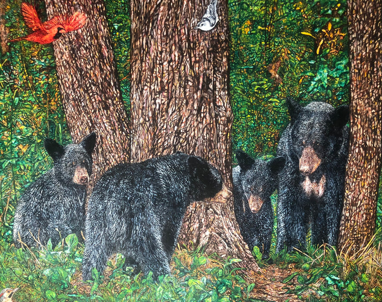 A happy family of black bears